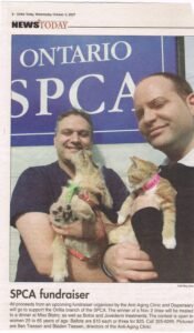 SPCA fundraising event with organizers and cats in Orillia, Ontario