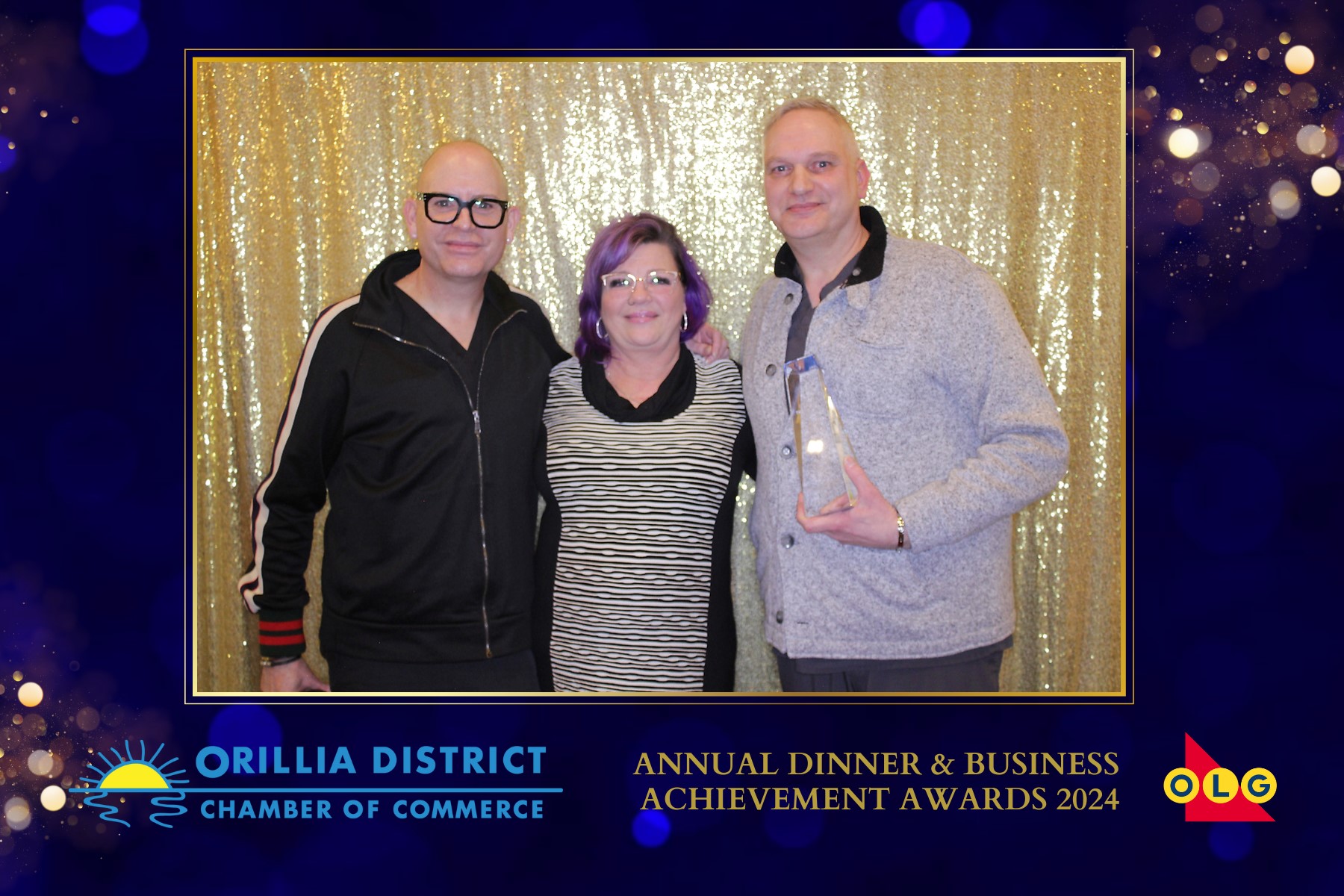 Three people smiling at Orillia Chamber of Commerce Awards 2024
