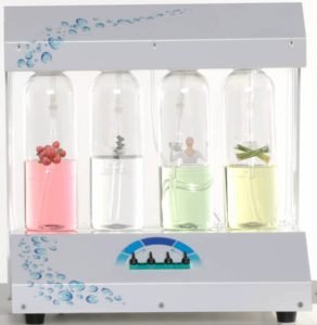 Multi-chamber aroma diffuser with transparent bottles